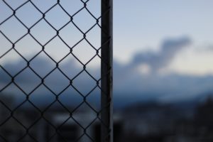 black metal fence during daytime