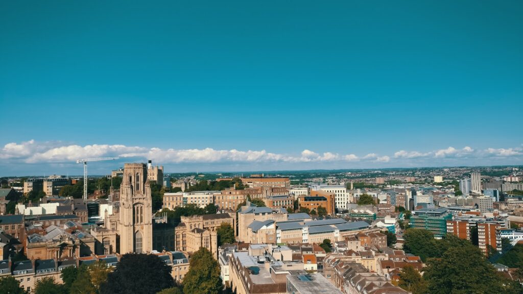 city with high rise buildings under blue sky during daytime