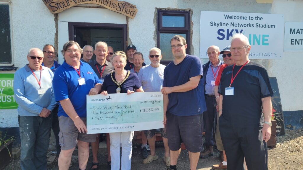 Cllr Elisabeth Malvisi, Chair of Babergh District Council, presents a cheque Adrian Beckham and the team atCllr Elisabeth Malvisi presents cheque for £3,280 to Stour Valley Men’s Shed Stour Valley Men’s Shed, photo courtesy Babergh District Council