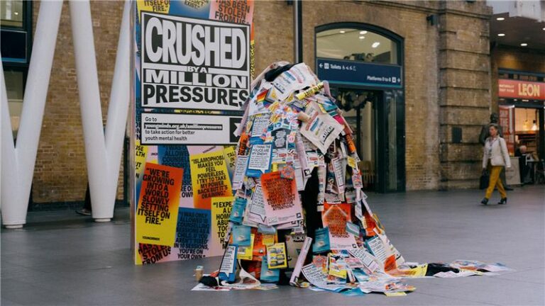 YoungMinds 'Crushed by a million pressures' art installation at Kings Cross station in London.